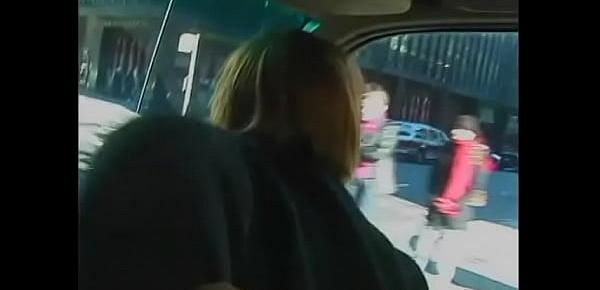  Redhead chick gets excited when two old dudes drive her around the city and at the same time hang clothespins on her nipples